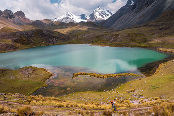 Family on a trekking tour in the wild mountains of the Andes, Ausangate, Vilcanota, Peru, South America