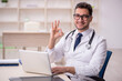 © Elnur - Young male doctor in telemedicine concept