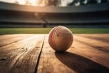Fototapeta Sport - Image of Cricket leather ball resting on the stadium generative AI