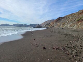 Wall Mural - Black sand beaches are relatively rare and one of them is found along the coast of Northern California near the city of San Francisco