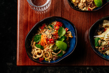 Wall Mural - fried Chinese rice with chicken, vegetables and herbs. restauran