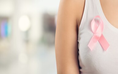 Poster - Cancer awareness concept, woman with pink ribbon