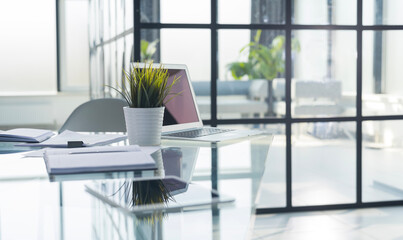 Stylish workspace with laptop, office supplies. Desk work concept.