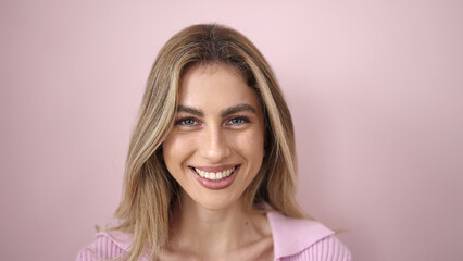 Sticker - Young blonde woman smiling confident standing over isolated pink background