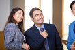 © Niks Ads - indian businessman standing with female manager at office.