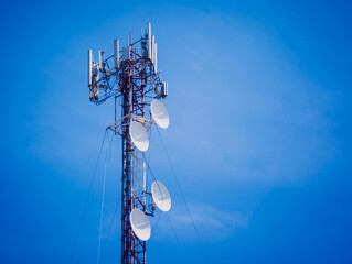 5G Cell Towers for smart mobile telephone on sky background