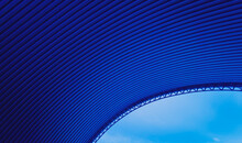 Abstract Background Spiral Metal Arch On Blue Sky