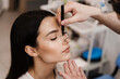 © Rabizo Anatolii - ENT doctor is drawing mark up lines on nose before rhinoplasty surgery. Rhinoplasty markup. Rhinoplasty is reshaping nose surgery for change appearance of the nose and improve breathing.