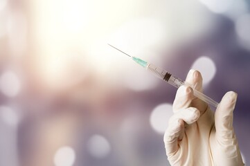 Sticker - syringe of Vaccine in doctor hands in hospital