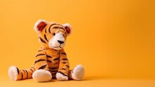 Tiger Plush Toy Isolated On Orange Background With Copy Space For Text. Generative Ai Tiger Toy