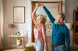 © Prostock-studio - Happy Senior Couple Dancing Having Fun At Home On Weekend