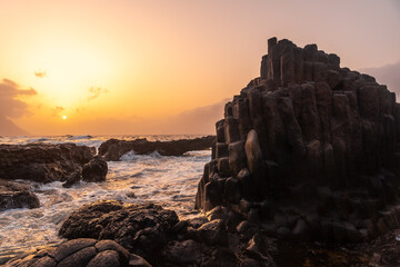 Wall Mural - El Hierro Island. Canary Islands, landscape of volcanic rocks in the natural pool of Charco azul in spring orange sunset