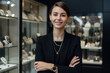 © aicandy - Confident retail manager with a modern haircut, standing in front of a display of high-end jewelry in her luxury jewelry store, generative ai