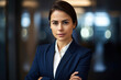 © aicandy - Portrait of a confident and professional compliance officer in a modern office setting, dressed in a sleek business suit and wearing a thoughtful expression on her face, generative ai