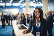 © aicandy - Portrait of a dedicated and hardworking meeting and convention planner, standing in front of a busy event registration desk and assisting attendees with a warm smile, generative ai