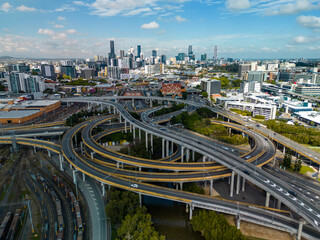 Poster - Aerial shot of Brisbane city and highway traffic in Australia in daytime