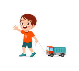 little kid playing a toy truck and feel happy