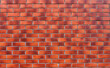 Brick wall background. Red old bricks masonry backdrop. Stone texture for architecture and interior. 