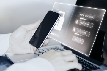 Canvas Print - Close up of hands using laptop and cellphone with glowing padlock interface on blurry background. Safety, security and protection concept.