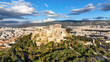 Aerial drone dramatic shot above unique Acropolis hill and the Parthenon an Unesco world heritage site, Athens historic centre, Attica, Greece