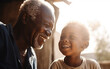 Senior dark-skinned black african american man playing with his grandchild. Active and healthy grandfather concept. Generative AI