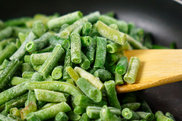 Frozen green beans. Selective focus. Healthy nutrition. Frozen beans vitamins