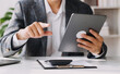© ARMMY PICCA - Businessman working at office with documents on his desk, doing planning analyzing the financial report, business plan investment, finance analysis concept