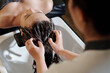 © DragonImages - Young woman getting deep cleanse procedure in beauty salon