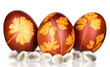 Eggs and willow branches on wooden background.