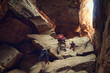 © Westend61 - Friends climbing on rocks at Cederberg Mountain trek