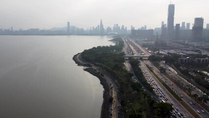 Canvas Print - Aerial view of cars transporting on the highways near the coast in Shenzhen, Guangdong, China