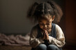 © JoelMasson - Portrait of young African American girl in prayer