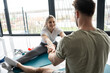 © BalanceFormCreative - Young couple working out and practicing yoga in the comfort of their own home.