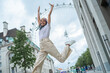 © Tessy Morelli/Stocksy - Triumphant jump at London Eye
