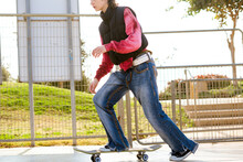 Teen Girl Posing In A Skate Park 