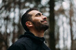 © Studio Firma/Stocksy - Man Meditating Outdoors