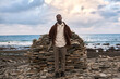 © Studio Cavia/Stocksy - Fashion editorial at the sea