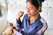 Timeless and Reliable: Young Indian woman checks her watch for punctuality and style.