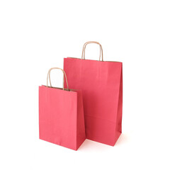  Red craft bags on a white background. Place for text and logo. The concept of packaging, gift, delivery. High quality photo