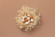 Natural Wooden Eggs In Nest From Wood Shavings.