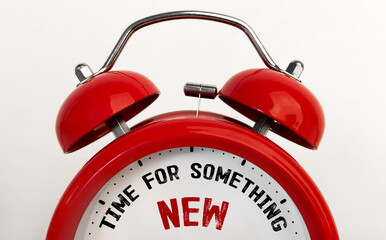 Poster - red alarm clock with text time for something new