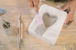 © Bianca Beltran/Stocksy - Heart-shaped ceramic mold