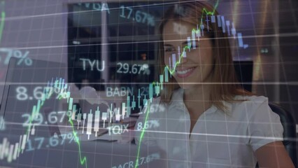 Poster - Animation of financial data processing over caucasian businesswoman using computer in office