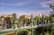 Decorative fence in Paris, France, in the beautiful Parc des Buttes Chaumont. Shallow focus for effect on the first large fleur de lis