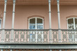 Beautiful, decorative iron railing on a balcony on a home in the French Quarter.