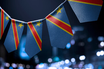 Wall Mural - A garland of Democratic Republic of the Congo national flags on an abstract blurred background