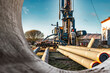 © Anoo - The drilling rig close-up is drilling a well against the background of the cloudy sky. Deep hole drilling. Geological exploration work. mineral exploration. Extraction of gas and oil.