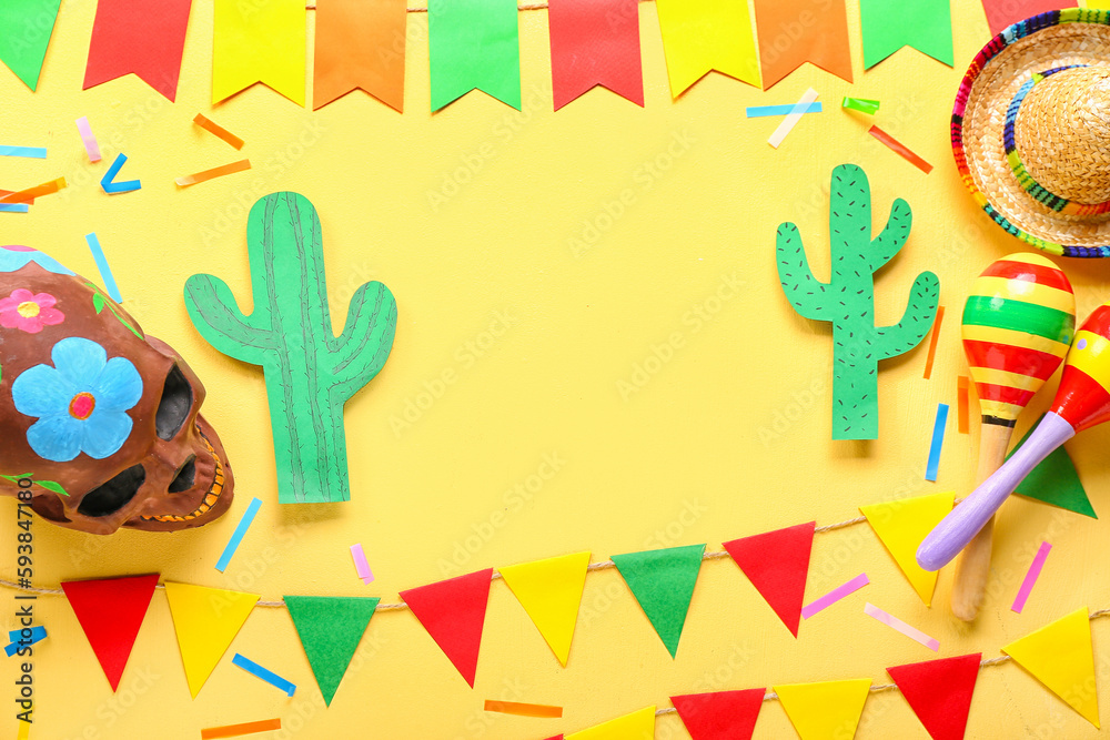 Frame made of Mexican symbols with flags on yellow background