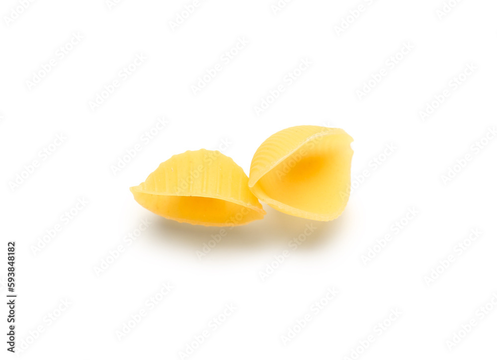 Raw conchiglie pasta isolated on white background
