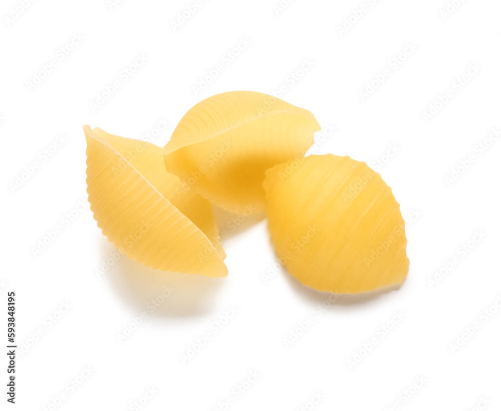 Raw conchiglie pasta isolated on white background